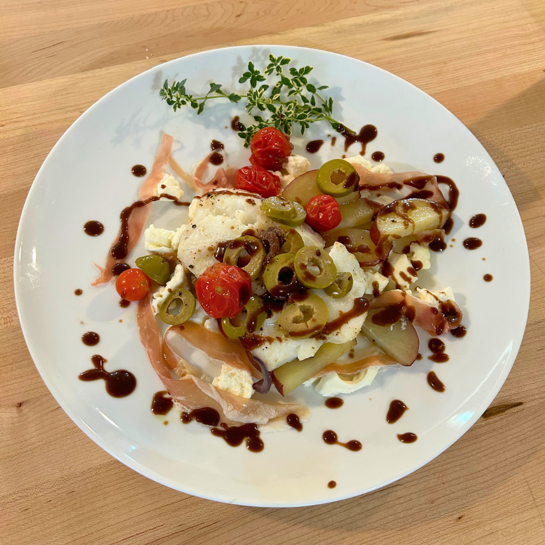 Cod with Black Garlic Sauce, Fresh Mozzarella, and Prosciutto